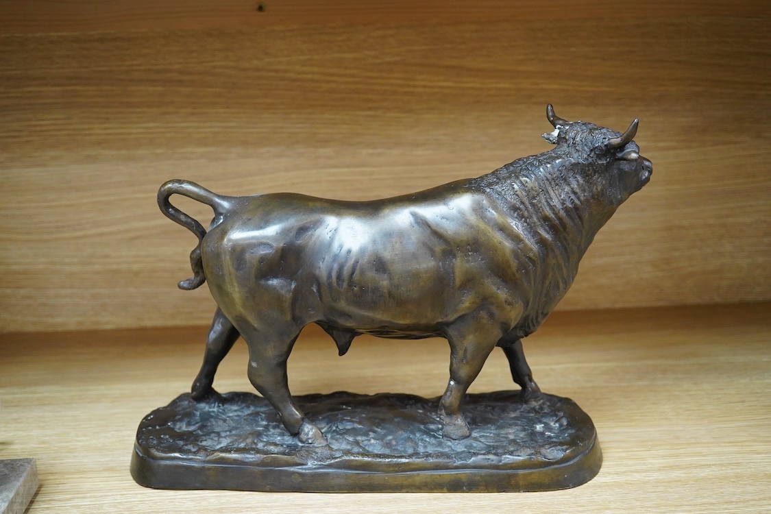 An Animalier style bronze model of a bull, unsigned, 33cm wide